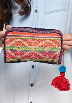 Our Aztec tapestry makeup bag with tassel zipper closure is adorable. The vibrant embroidery and fun tassel accents makes this bag stand out from the rest. Approximate Measurements: 23" X 17" Cotton Zipper closure Tassel accent Multicolor Tassel Pouch Bag, Bohemian Pouch Cosmetic Bag For Travel, Bohemian Rectangular Travel Cosmetic Bag, Bohemian Cosmetic Pouch For Travel, Bohemian Cosmetic Bag For Travel, Bohemian Multicolor Bags With Zipper Closure, Bohemian Multicolor Bags With Zipper, Bohemian Woven Travel Pouch, Multicolor Embroidered Travel Pouch