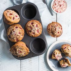 muffins with cranberry filling in a muffin tin