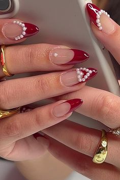 Red nails are fiery and fun and never fail to catch a few eyes along the way. Discover red nail ideas to try that you'll totally obsess over. Stilleto Red Nails Designs, Red And Gold Stiletto Nails, Cherry Red Stiletto Nails, Red Stiletto Valentines Nails, Red And Gold Press On Nails