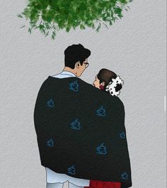 a man and woman wrapped in a blanket under a tree