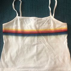 White Crop Top With Rainbow Stripe Across The Top/Bust Area, With Spaghetti Straps. Labeled One Size, But Fits Like A Small. No Trades. White Trendy Cami Tank Top, Cute White Camisole Top, Multicolor Cotton Tank Top For Day Out, Cute White Camisole Crop Top, White Summer Crop Top With Spaghetti Straps, White Fitted Summer Tank Top, Cute Cropped White Top, Cute White Cropped Top, Fitted White Summer Tank Top