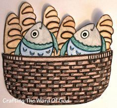 two fish are sitting in a basket on the wall