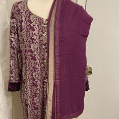 Three Piece Beautiful Wedding Formal Dress.Brand Cross Stitch.Fabric Is Pure Chiffon.Full Sirt Have Sequins Work And Embroidery Work.Sz Approximately Bust 22”Waist 19”Arm 19.5”Length 44”Shalwar Lenght Is 38” Elegant Purple Salwar Kameez With Traditional Drape, Elegant Purple Dress With Lace Work, Elegant Unstitched Purple Dress, Elegant Lace Salwar Kameez For Party, Elegant Purple Dress With Resham Embroidery, Elegant Purple Dress With Intricate Embroidery, Formal Dresses With Chikankari Embroidery, Formal Fitted Purple Salwar Kameez, Fitted Bollywood Lace Dresses