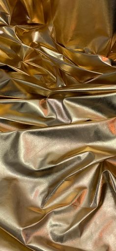 an image of shiny gold fabric