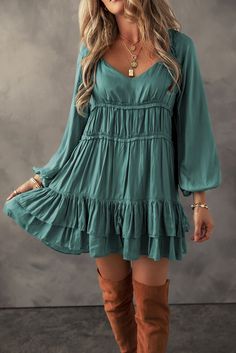 This dress effortlessly combines chic style with a relaxed charm, perfect for casual get-togethers with friends. Featuring a loose fit silhouette, it offers both comfort and fashion, while the tiered ruffle design adds a feminine touch to the overall look. Made from premium fabric, this mini dress is lightweight and breathable, with delicate puff sleeves and charming ruffles, this dress exudes a playful and flirtatious aesthetic, ideal for those seeking a touch of whimsy in their wardrobe. Size Flirty Aesthetic, Tiered Ruffle Mini Dress, Ruffle Tiered Dress, Cozy Accessories, Fitted Mini Dress, Weather Wear, Ruffle Mini Dress, Puffed Sleeves Dress, Feminine Look