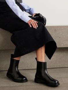 Loewe's 'Blaze' Chelsea boots are as classic as they come. Made in Italy from smooth leather, they have elasticated panels for easy on-and-off and chunky rubber soles. Wear yours with everything from dresses to jeans. Designer Chelsea Boots With Leather Sole For Work, Designer Leather Chelsea Boots For Workwear, Chelsea Boots For Workwear With High Ankle, Elegant Chelsea Boots With Reinforced Heel For Work, Workwear High Ankle Chelsea Boots, Designer Chelsea Ankle Boots For Work, Leather Chelsea Boots For Work, Luxury Round Toe Chelsea Boots For Work, Luxury Chelsea Boots With Round Toe For Work