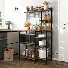 a kitchen with an oven, dishwasher and shelves