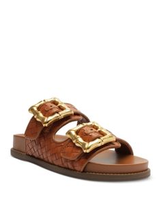 Schutz Women's Enola Slip On Buckled Slide Sandals Designer Open Toe Sandals With Gold Buckle, Luxury Leather Sandals With Gold Buckle, Designer Leather Sandals With Gold Buckle, Brown Leather Sandals With Gold Buckle, Designer Open Toe Sandals With Woven Leather, Luxury Sandals With Buckle Closure For Vacation, Designer Brown Sandals With Tang Buckle, Designer Brown Sandals With Buckle Closure, Luxury Beach Sandals With Tang Buckle