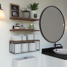 the bathroom is clean and ready to be used as a storage area for toiletries