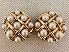 "Timeless TRIFARI ALFRED PHILIPPE Pearl Latticework Clip On Statement Earrings c. 1950s-60s -A cluster of faux pearls in a gold tone latticework setting -Clip ons  -Signed Trifari  -Excellent vintage condition with age appropriate wear  -Size: 1 1/4\" diameter" Vintage Trifari Earrings, Vintage Gold Pearl Clip-on Earrings, Black Tissue Paper, Gold Jewellry, Vintage Clip On Earrings, Vintage Jewelry Sets, Trifari Jewelry, Bee Brooch, Gold Clips