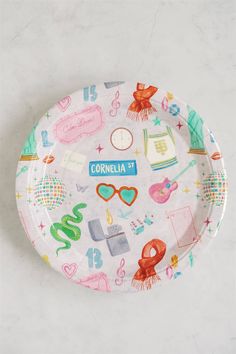 a paper plate with various items on it and the words cornella printed on it