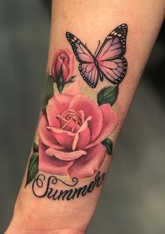 a pink rose and butterfly tattoo on the left arm with words summer written in cursive font