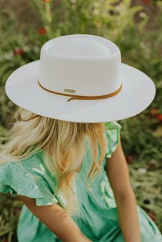 Introducing the Wren - designed with your lifestyle in mind! This flat brim, round top off white hat features a dipped telescope crown adorned with a genuine leather chin strap - to take this hat to the next level! The Wren proves comfort can be stylish and that it’s the details that really matter. White Panama Hat With Short Brim For Rodeo, White Short Brim Panama Hat For Rodeo, White Western Boater Hat With Curved Brim, White Brimmed Panama Hat For Rodeo, White Western Boater Hat For Rodeo, White Boater Hat For Rodeo, White Short Brim Hat For Ranch, White Short Brim Ranch Hat, White Curved Brim Boater Hat For Rodeo