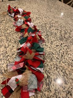 a long row of burlap and jute ribbons sitting on top of a counter