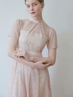 Soft and drapery, this lightweight dress has sheer texture with pearly embroidery and sequin detail throughout. Wide, detachable waist belt provides slim fitting, versatile fit.  - Airy tulle fabric- Drapery silhouette in long length- Semi high neckline with shirred detail- Back pearl button closure- Lovely, luxurious mood Short Sleeve Lace Dress With Sheer Bodice, Elegant Lace Sequin Dress For Spring, Elegant Spring Lace Sequin Dress, Elegant Spring Sequin Lace Dress, Spring Evening Dress With Sheer Bodice, Feminine Spring Evening Dress With Sheer Bodice, Elegant Dress With Sheer Bodice And Short Sleeves, Elegant Short Sleeve Dress With Sheer Bodice, Elegant Fitted Sheer Sequin Dress