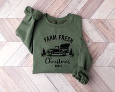 Farm Fresh Christmas Trees Truck Shirt,Christmas Sweatshirt,Christmas Family Shirt,Truck Shirt,Christmas Shirt,Christmas Tree,Christmas Gift * High quality and super soft, comfortable shirt. Made with top-of-the-line vinyl and pressed with a professional grade heat press. * Please check all color and size charts before place the order. Since all shirts are custom made based on your selection, I don't accept return or exchange unless there is an issue with your order. *We're working with different shirt brands based on the color/size availability. All shirts we use are soft style, not heavy cotton. Solid colors are all cotton and heather colors are cotton/poly blend. (there may be exceptions) *Our Sweatshirt 70% SoftLume combed and ring-spun cotton, 30% polyester fleece- with 100% SoftLume White Christmas Movie, Christmas Movie Shirts, Farm Fresh Christmas Trees, Christmas Tree Sweater, Truck Shirt, Tree Sweater, Womens Christmas Shirts, Fresh Christmas Trees, Winter Shirts