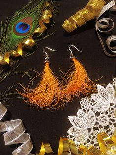 These tassel earrings are lightweight and easy to wear with any outfit; from a night dancing to an afternoon in T-shirt and jeans. They make a fun accessory to wear to festivals. Boho Gifts, T Shirt And Jeans, Tassel Earrings, Festival Wear, Gifts For Teens, Favorite Jewelry, Jewelry Earrings Dangle, Gift For Her, Tassels