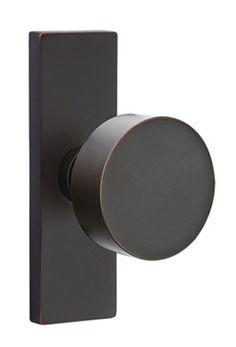 an image of a door handle with a round knob on it's back side