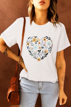 White Floral Heart Graphic Tee Casual Heart Print T-shirt For Spring, Summer Tops With Heart Graphic And Crew Neck, Summer Graphic Tee With Heart Print, Casual Short Sleeve Tops With Heart Graphic, Casual Heart Graphic T-shirt For Spring, Casual T-shirt With Heart Graphic For Spring, Trendy Heart Print T-shirt For Spring, Spring Heart Graphic T-shirt, Spring Graphic Tee With Heart Design