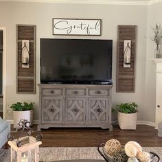 the living room is clean and ready to be used for tv's, as well as other decorations