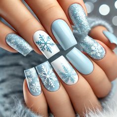 "Stay cool and classy this winter with blue nails! From icy shades to deep midnight blues, these chic winter nails capture the season’s frosty beauty while adding an elegant touch to any look. Perfect for those who love a sophisticated, winter-inspired manicure!" Winter Nails With Sweater Design, Snow Blue Nails Winter, Sky Blue Christmas Nails, Ice Blue Snowflake Nails, Sweater And Snowflake Nails, Pink And Blue Winter Nails, Snowy Blue Nails, Winter Nail Blue, Winter Fingernail Designs