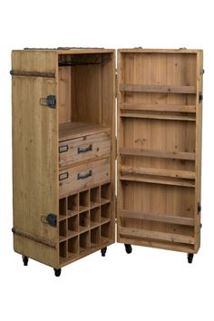 an open wooden cabinet with drawers on wheels