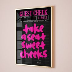 a poster with the words take a seat, sweet cheeks written in pink on it