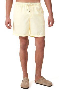 Cool and comfortable in lightweight fabric, these shorts have a stretchy waistband for pull-on-and-go ease. 6" inseam; 11 3/4" front rise Elastic/drawstring waist Front slant pockets; back hook-and-loop patch pocket 100% polyester Machine wash, line dry Imported Casual Solid Color Short Leg Swim Trunks, Spring Bermuda Athletic Shorts With Built-in Shorts, Casual Bottoms With Short Inseam For Poolside, Relaxed Fit Short Swim Trunks, Relaxed Fit Athletic Shorts With Short Inseam For Spring, Summer Nylon Shorts With Side Pockets, Solid Color Swim Trunks With Side Pockets For Summer, Summer Swim Trunks With Pockets And Short Leg, Spring Vacation Relaxed Fit Athletic Shorts