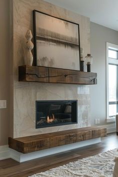 a living room with a fire place in the center and a painting on the wall