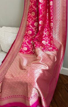 🌺Beautiful Semi Katan Silk Banarasi Saree in Rani  pink Color. 🌺Ethnic Traditional Semi Katan Banarasi Saree with all over floral jaal butta with thread weaving gold. . 🌺Blouse piece comes with the saree.🌺. Ready to wear saree Fall , Pico and Tassels done 🌺perfect for wedding and parties. Length: 6 m (Unstitched Blouse piece included). 🌺Wash care: Dry clean only. 🌺The product color may slightly vary due to photographic lighting sources or your computer settings. 🌺 please contact us if you have any questions regarding the product. Rani Color Banarasi Saree, Pink Banarasi Saree Blouse Design, Transitional Pink Saree With Zari Work, Rani Pink Saree Silk, Bollywood Style Pink Saree For Transitional Season, Pink Bollywood Saree For Transitional Season, Pink Self-design Saree For Eid, Pink Traditional Wear For Festive Ceremonies, Pink Katan Silk Traditional Wear