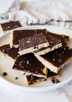 a white plate topped with chocolate covered shortbreads