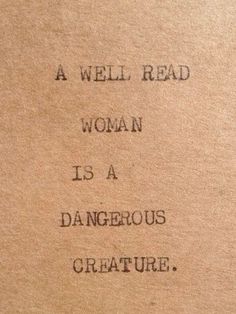 a well read woman is a dangerous creature written on a piece of paper with black ink