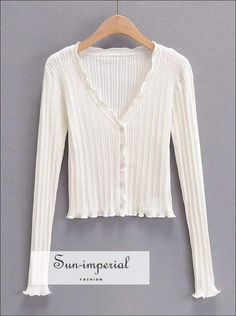 Sun-imperial Women White V-neck Ribbed Knit Cardigan with Ruffle Trims detail Basic style, chick sexy street vintage style SUN-IMPERIAL V-neck Ruffled Sweater For Fall, Winter V-neck Top With Ruffles, Spring V-neck Ruffled Sweater, Ribbed Cotton V-neck Cardigan, White Ruffled Cardigan For Fall, V-neck Ruffled Cardigan For Layering, White Casual Cardigan With Ruffles, White Casual Ruffled Cardigan, Casual White Ruffled Cardigan