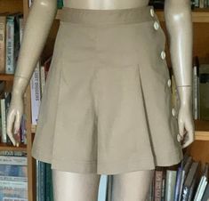 Fabulous 1940's Pleated Shorts Fabric is a 100%  cotton drill in 'outback' beige - ready for an adventure  These 40's  shorts are just fabulous . They have large pleats front and back - so extremely flattering. Side buttoning closure using gorgeous cream Vintage Buttons .  All my garments are handmade with great care and attention to detail as I try to capture the look and essence of a bygone era. PLEASE NOTE: All measurements are taken lying flat so be aware of the fit you prefer - snug or rela 1940s Shorts, Bygone Era, Pleated Shorts, Skorts, Vintage Buttons, Short Outfits, Favorite Outfit, Essence, Bathing Beauties