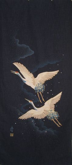 two cranes flying through the night sky