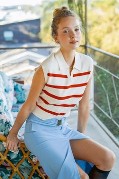 Introducing our Striped Polo Top - a chic addition to your wardrobe. Features include a feminine point collar and a fitted flattering bodice. Fabric Contents: 50% Rayon 30% Polyester 20% Nylon Size Measurement (inch): S: 16.0 (Bust), null (Waist), null (Hips), 20.0 (Length) M: 16.5 (Bust), null (Waist), null (Hips), 20.5 (Length) L: 17.0 (Bust), null (Waist), null (Hips), 21.0 (Length) Chic Summer Tops With Striped Collar, Fitted Collar Top For Day Out, Fitted Tops With Striped Collar, Fitted Tops With Striped Collar For Spring, Fitted Tops With Striped Collared Shape, Fitted Top With Striped Collar, Sleeveless Polo Outfit, Smart Casual Office, White Jumpsuit Dress