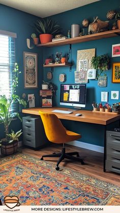 a home office with blue walls and lots of plants