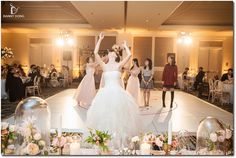 the bride and groom are dancing on the dance floor at their wedding reception in an elegant ballroom