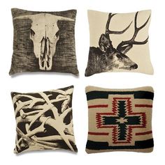 four pillows with different designs on them and one has a deer skull in the middle