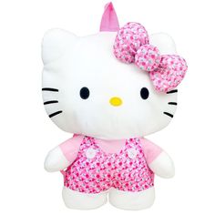 a hello kitty stuffed animal wearing a pink dress