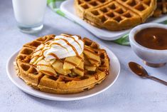 waffles with ice cream and caramel drizzled on top