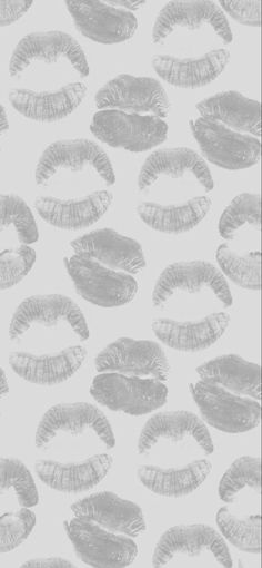 an image of some lips on a white background with black and grey colors in the middle