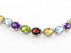 5.44ctw Oval Glacier Topaz(TM), 4.42ctw Oval Golden citrine, 4.34ctw oval Vermelho Garnet(TM), 3.32ctw Oval Manchurian Peridot(TM), and 3.32ctw oval African amethyst Gemstone Rhodium Over sterling Silver Tennis Bracelet. Measures approximately .31"W. Hidden box clasp. Double Safety. Oval Multicolor Gemstones With Accents, Silver Tennis Bracelet, Almandine Garnet, Jewelry Television, Box Clasp, Garnet Gemstone, Topaz Gemstone, Amethyst Gemstone, Tennis Bracelet