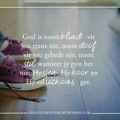 a person's feet with purple shoes on the floor and a quote about god is not blind via you trade nie, not dof