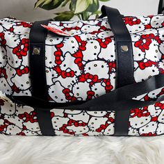 Hello Kitty, Traveling Suitcase Duffel Bag With Wheels. Brand New With Tag. All Over Hello Kitty Print. Has Wheels And Telescopic Handle To Pull/Roll Bag. Removable And Adjustable Shoulder Strap. The Inside Has A Zipper Compartment On One Side And Slip Pockets On The Other Side. Approx. 18" X 12" Hello Kitty Traveling, Traveling Suitcase, Hello Kitty Pattern, Sanrio Handbags, Hello Kitty Print, Rolling Duffle Bag, Hello Kitty Bag, Travel Suitcase, Duffel Bag Backpack