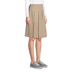 Classic pleats in our easy-care blend fabric that resists stains, wrinkles and fading so she looks good all school day long. Top-of-knee length. Pleated Cotton Skort For Work, Cotton Skirt With Accordion Pleats For Work, Classic Cotton Pleated Waist Skirt, Classic Cotton Pleated Skirt With Accordion Pleats, Pleated Cotton School Uniform Bottoms, Short Cotton Pleated Skirt In Solid Color, Cotton School Uniform Bottoms For Fall, Classic Pleated School Bottoms, Classic Short Cotton Skirt