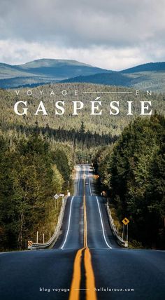 an empty road with the words voyage in gaspesie on it's side