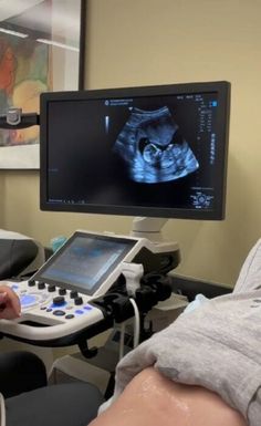 a man is in the operating room with an x - ray machine on his arm