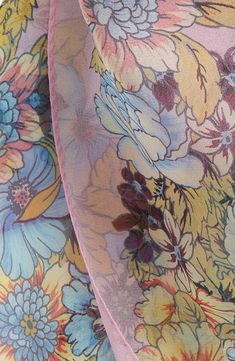 The pastel-hued flowers printed on sheer silk form dimensional bouquets as you wrap, layer or tie this rectangular scarf. 53" length, 33" width 100% silk Dry clean Made in Italy Pink Floral Print Silk Scarf, Silk Scarves With Floral Print For Spring, Pink Floral Print Feminine Scarves, Pink Feminine Floral Print Scarves, Feminine Pink Floral Print Scarves, Pink Silk Scarf With Floral Print, Pink Floral Print Silk Scarves, Bohemian Pink Floral Print Silk Scarf, Silk Scarf With Floral Print For Wedding