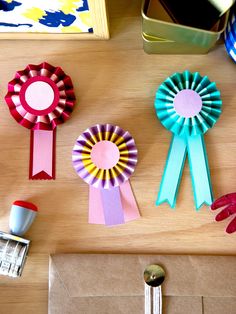 several ribbons and other crafting supplies on a table